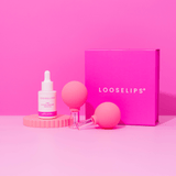 photo of the looselips supercharged bakuchiol skin oil and face lifters against a bright pink background